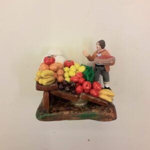 Composizione in terracotta per il cm.7 Venditore di ortaggi